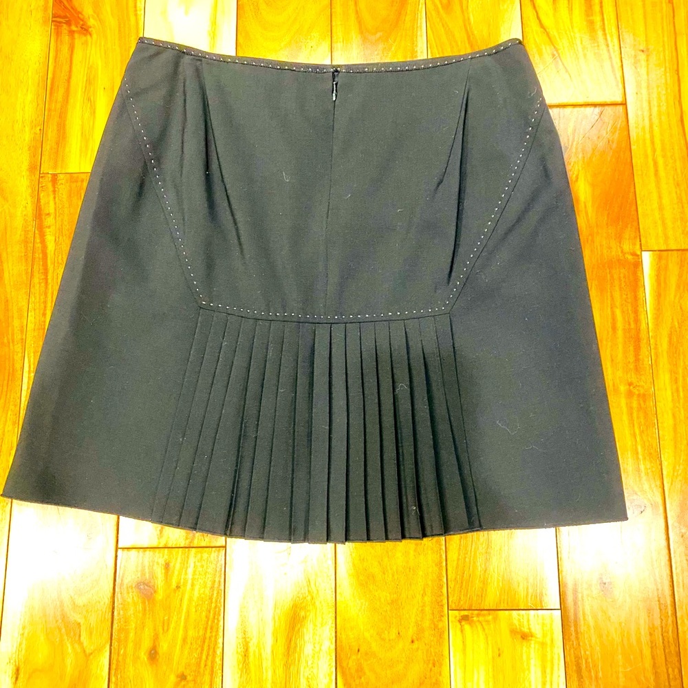 Tahari - black skirt with ruffle detail in back